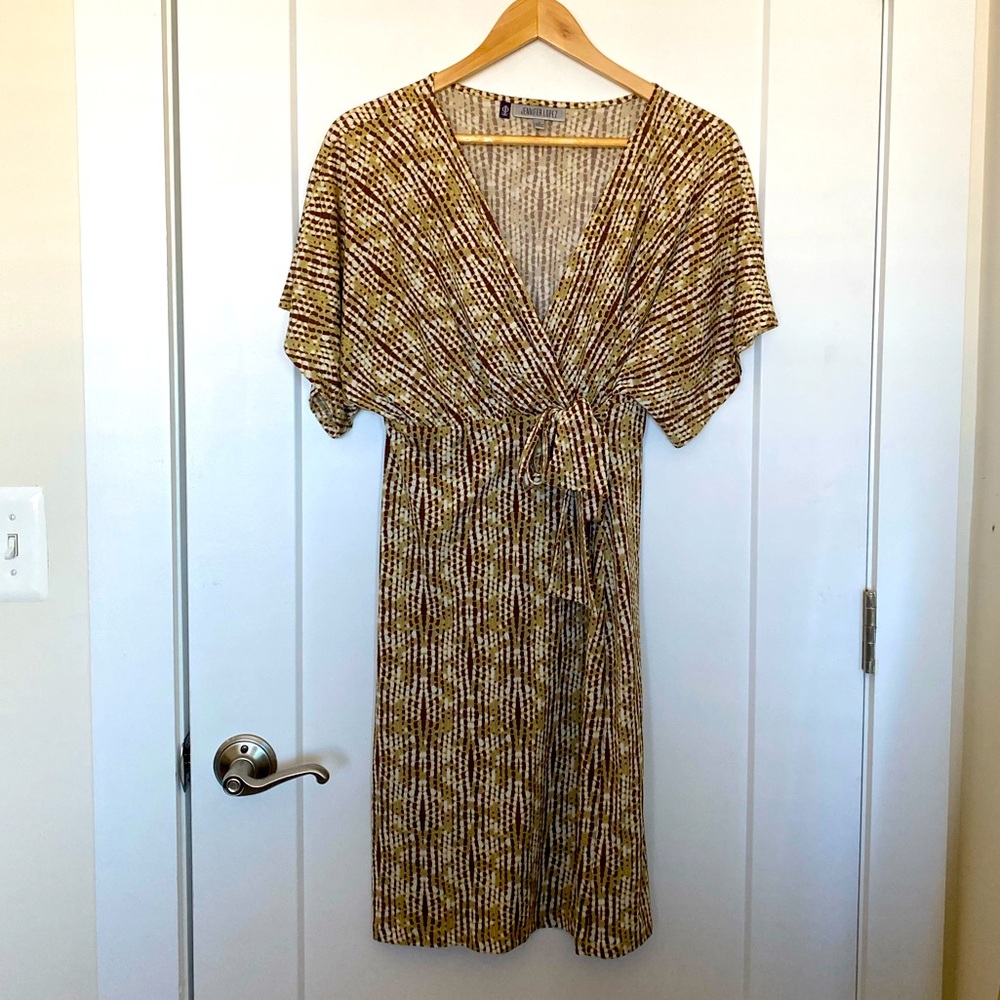 Smokin hot!  Like new JLo Size Small Warm Reptile print sexy low cut dress.